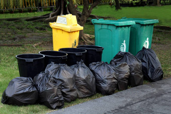 本浪费塑料垃圾黑色的袋本桩本垃圾垃圾污垢垃圾袋花园公共公园回收本浪费