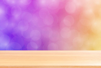 空木表格地板上模糊散景软紫色的梯度背景木板材空紫色的散景<strong>色彩</strong>斑斓的光阴影<strong>色彩</strong>斑斓的散景灯梯度软横幅广告产品