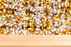 木板材散景金黄色的色彩斑斓的圣诞节背景空木表格地板散景闪闪发光的光黄金奢侈品木表格董事会空前面闪闪发光的黄金木散景照明发光