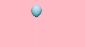 绿色彩色的气球孤立的粉红色的彩色的背景