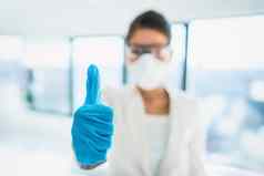 冠状病毒成功快乐新闻实验室研究员拇指医疗手套疫苗佩普科维德医疗保健