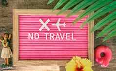 冠状病毒旅行禁止标志旅行取消了由于科维德旅行文本写粉红色的感觉信董事会热带背景夏天假期