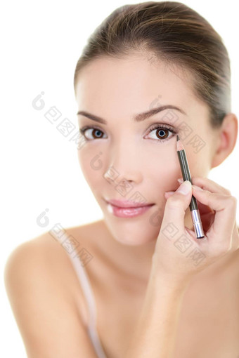 化妆美亚洲女人应用棕色（的）铅<strong>笔眼线笔</strong>眼睛脸眼睛护理生活方式孤立的白色背景