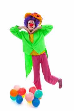 孩子穿着色彩斑斓的有趣的小丑