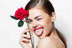 女人红色的花显示舌头用螺钉固定眼睛奢侈品光