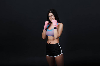 运动员泰拳<strong>泰国</strong>女人<strong>拳击</strong>手肖像的立场工作室黑色的背景