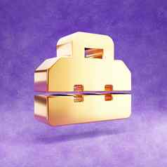 工具箱图标黄金光滑的工具箱象征孤立的紫罗兰色的天鹅绒背景