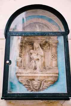建筑细节浅浮雕雕塑维珍玛丽婴儿耶稣威尼斯意大利浅浮雕装饰框架形式列拱
