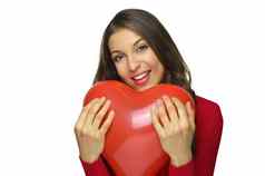有吸引力的年轻的女人持有红色的心空气气球白色背景情人节一天概念复制空间