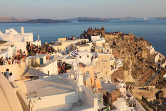 雅典希腊7月风景如画的村aio拥挤的游客日落显示圣托里尼岛岛希腊