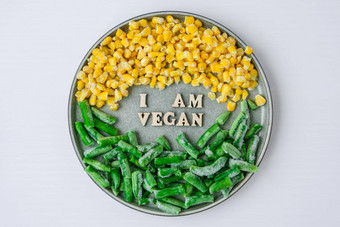 素食主义者文本板纯素食主义素食者健康的生活方式健康的吃素食主义者绿色豆子黄色的玉米