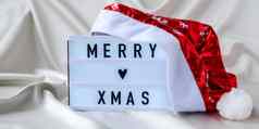lightbox文本快乐圣诞节圣诞老人他丝绸织物背景冬天假期概念