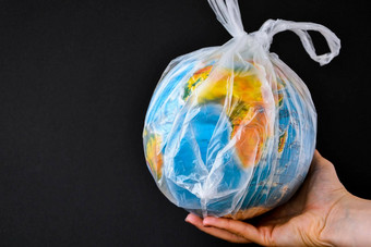 球形式全球<strong>塑料袋</strong>概念塑料污染地球世界环境一天概念玩具世界全球白色<strong>塑料袋</strong>