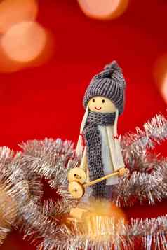 圣诞节装饰摘要红色的背景复制空间文本一年快乐圣诞节问候卡可爱的天使Gnome滑雪