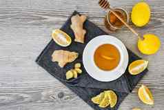 姜热免疫力提高维生素自然喝柑橘类蜂蜜成分乡村风格木背景洋甘菊茶