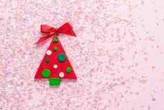 古董橡皮泥粘土圣诞节树粉红色的闪闪发光的背景最小的圣诞节概念快乐一年平躺前视图复制空间