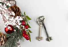 美丽的圣诞节背景装饰房子关键锁概念金融住房贷款前视图白色背景