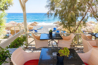 餐厅阳台前面海滩Kamari岛圣托里尼岛