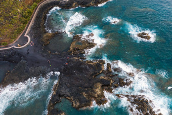 粗糙的岩石悬崖北tenerife黑色的海滩金丝雀岛屿岩石火山岩石大西洋海洋
