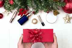 化妆品产品礼物盒子木背景