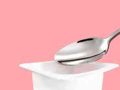 酸奶杯银勺子粉红色的背景白色塑料容器酸奶奶油新鲜的乳制品产品健康的饮食营养平衡