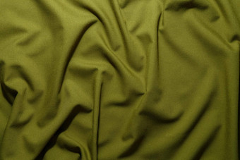 <strong>皱巴巴</strong>的橄榄绿色<strong>皱巴巴</strong>的如此卡其色帆布织物完整的框架背景纹理