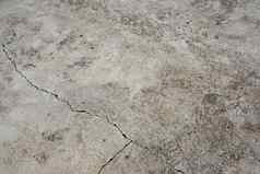 水泥地板上灰色裂缝分水泥部分不平等的大小纹理背景