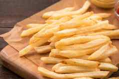 金美味的深法国薯条卡夫烘焙表纸服务托盘吃番茄酱黄色的芥末关闭生活方式