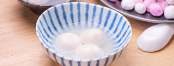 唐元汤圆元宵小碗美味的亚洲传统的节日食物大米饺子球塞馅料中国人灯笼节日关闭