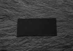 黑色的业务卡石头背景