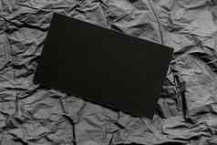 空白黑色的卡模型灰色的纸背景