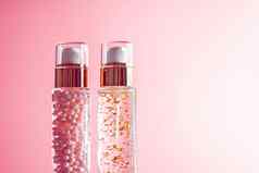 奢侈品护肤品产品玻璃瓶粉红色的背景