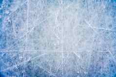 冰背景标志着滑冰曲棍球蓝色的纹理溜冰场表面划痕