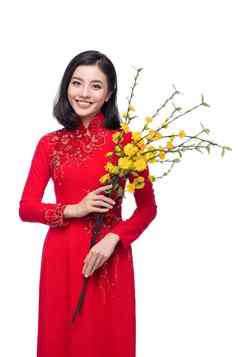 肖像美丽的亚洲女人传统的节日服装戴曼菊持有花五月树安德娜无可指责花泰特假期月球一年