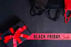 黑色的星期五出售黑色的礼物盒子购物袋在线购物