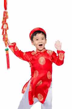 肖像有趣的令人兴奋的越南男孩鞭炮亚洲孩子庆祝一年