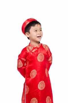 肖像英俊的亚洲婴儿男孩传统的节日服装可爱的越南男孩戴曼菊衣服微笑