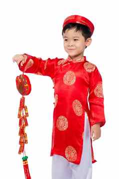 肖像有趣的令人兴奋的越南男孩鞭炮亚洲孩子庆祝一年