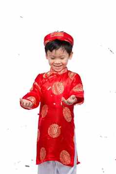 快乐越南男孩红色的戴曼菊庆祝一年五彩纸屑亚洲孩子庆祝一年