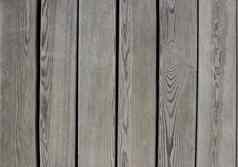背景灰色的垂直木木板背景纹理