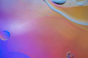 橙色紫色的摘要背景图片使石油水肥皂