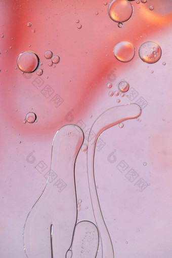 粉红色的摘要背景图片使石油水肥皂