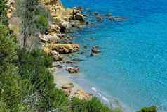 岩石海滩海边messenian区域夏天期美塞尼亚伯罗奔尼撒半岛希腊