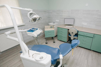 牙医办公室牙科卫生牙医的椅子现代牙科实践牙科椅子配件牙医蓝色的医生光