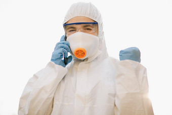 医疗工人肖像自信亚洲医生保护佩普西装穿脸面具眼镜工人化学保护西装白色背景