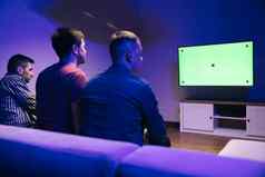 回来拍摄游戏玩家玩赢得在线视频游戏控制台绿色浓度关键屏幕个人舒适的晚上首页