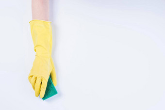看门人手黄色的手套持有海绵白色背景高质量照片
