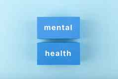 精神健康文本写黑暗蓝色的矩形中间明亮的蓝色的背景