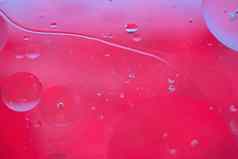 红色的摘要背景图片使石油水肥皂