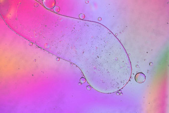 粉红色的摘要背景图片使石油水肥皂